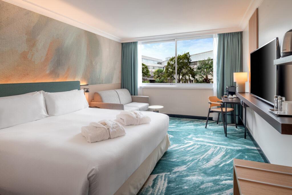 King-Family-Guest-Room-Bedroom-with-Bathrobes-scaled-1.jpg