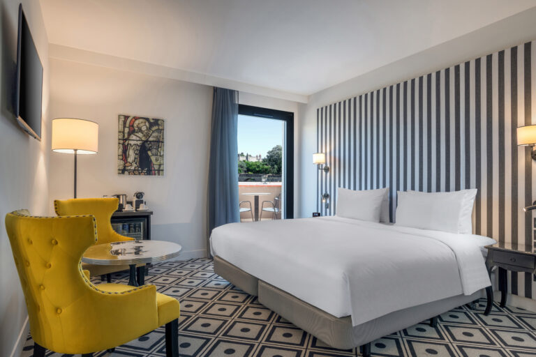 King-Deluxe-Room-Bedroom-scaled-1.jpg